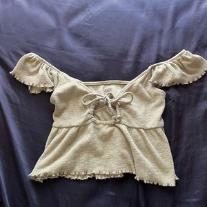 Olive green, off the shoulder, crop.